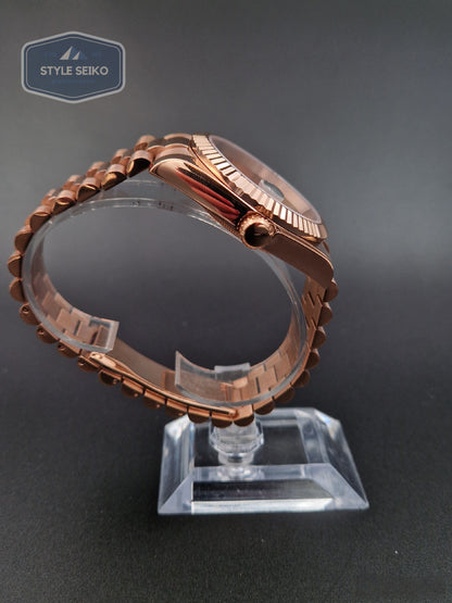 Datejust fall roséguld president-armbindel